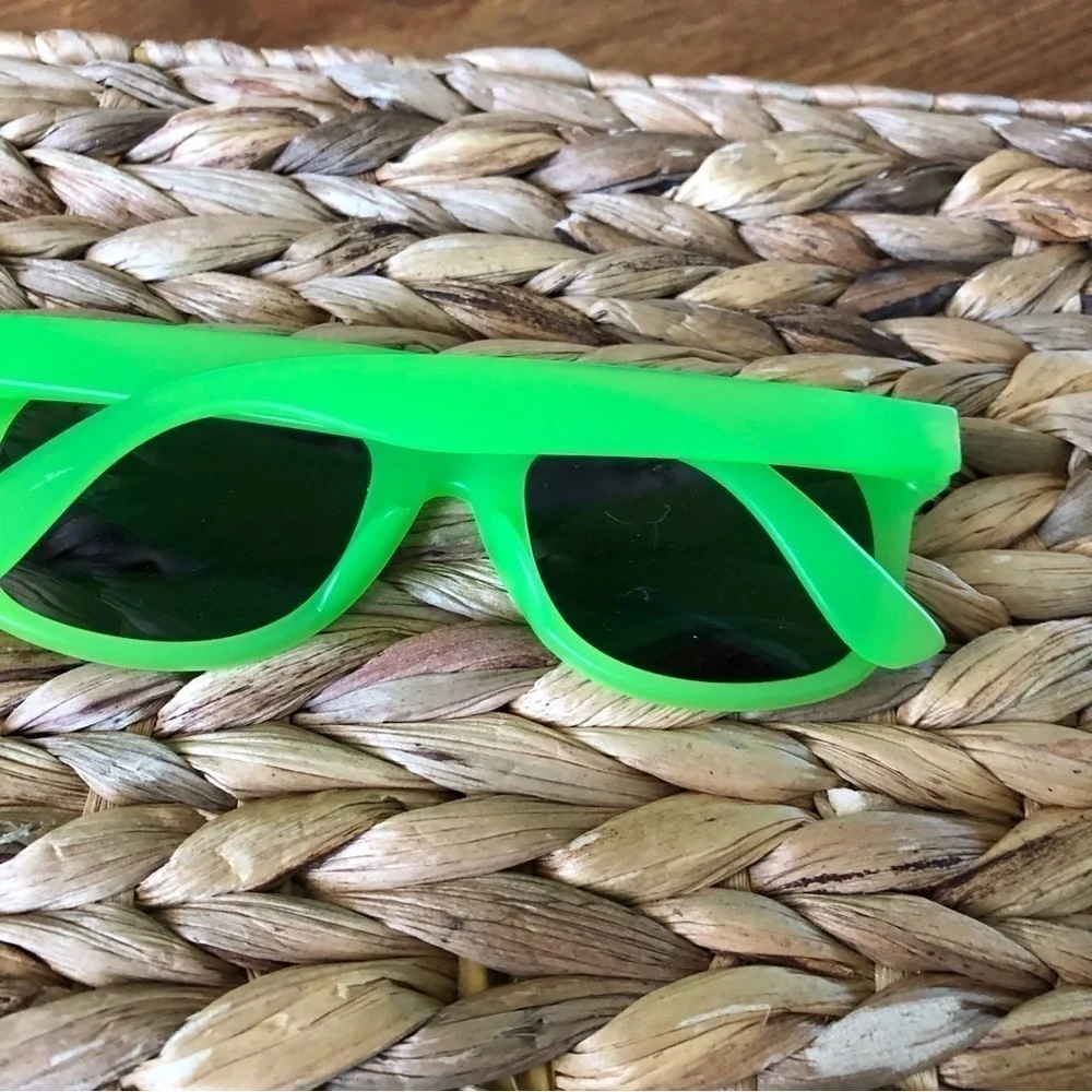 Neon green plastic sunglasses